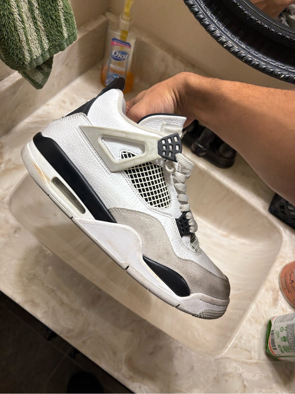 Jordan Men’s White and Black Retro 4 Sneakers